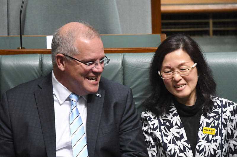 Australian Prime Minister Scott Morrison (left) sits next to Liberal member for Chisholm Gladys Liu.