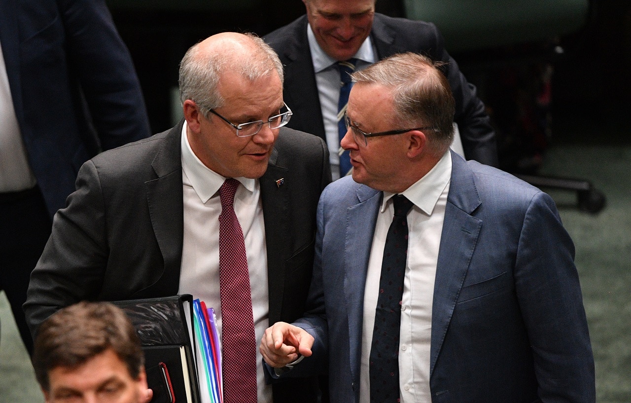 Scott Morrison and Anthony Albanese leave Question Time.