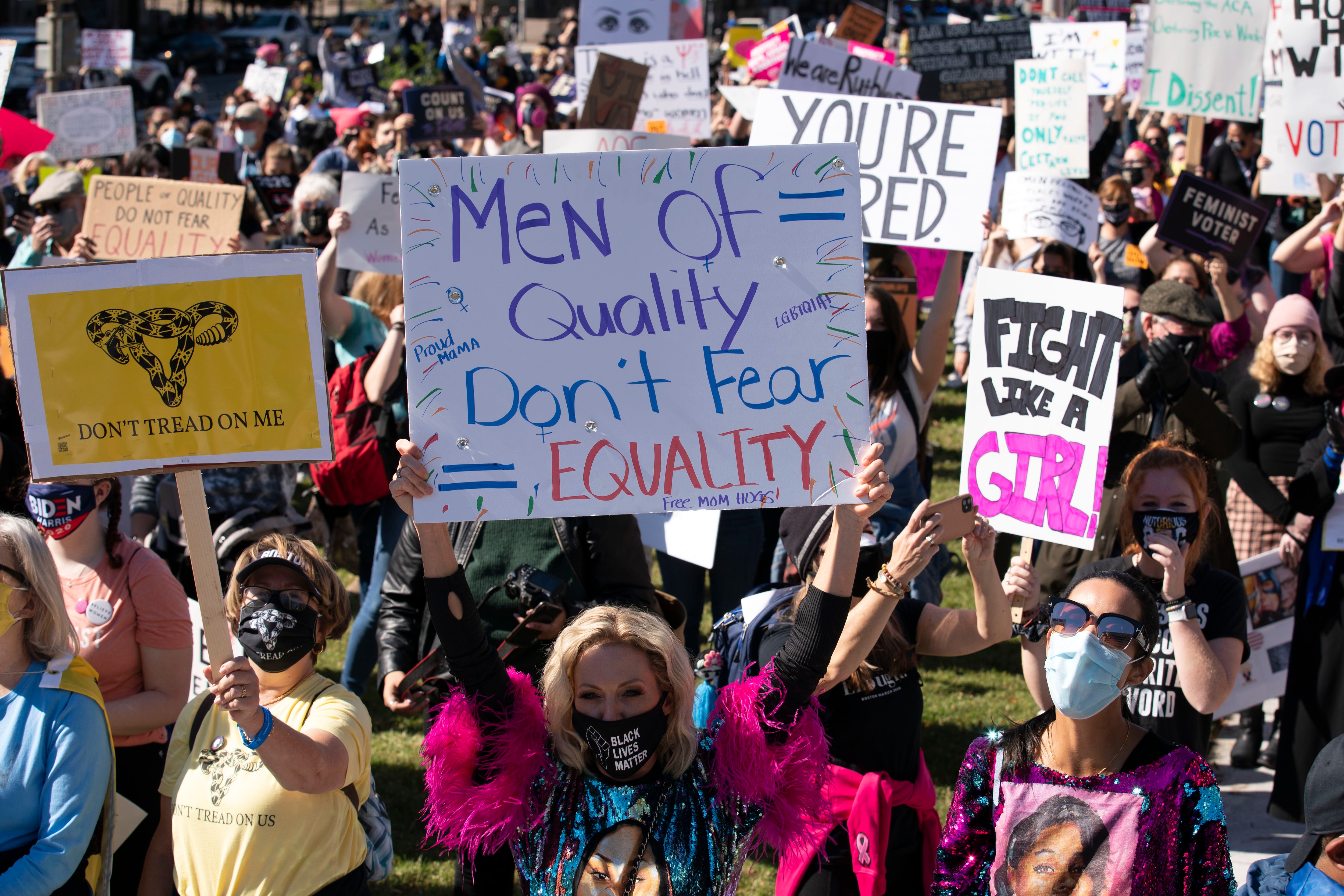 Protesters rally during the Women's March at Freedom Plaza, Saturday, Oct. 17, 2020, in Washington.