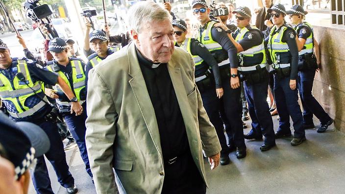 Cardinal George Pell arrives at an Australian court, in Melbourne, Australia, Monday, March 5, 2018. Pell attended a hearing to determine whether prosecutors have sufficient evidence to try him on sexual abuse charges. (AP Photo/Asanka Brendon Ratnayake)