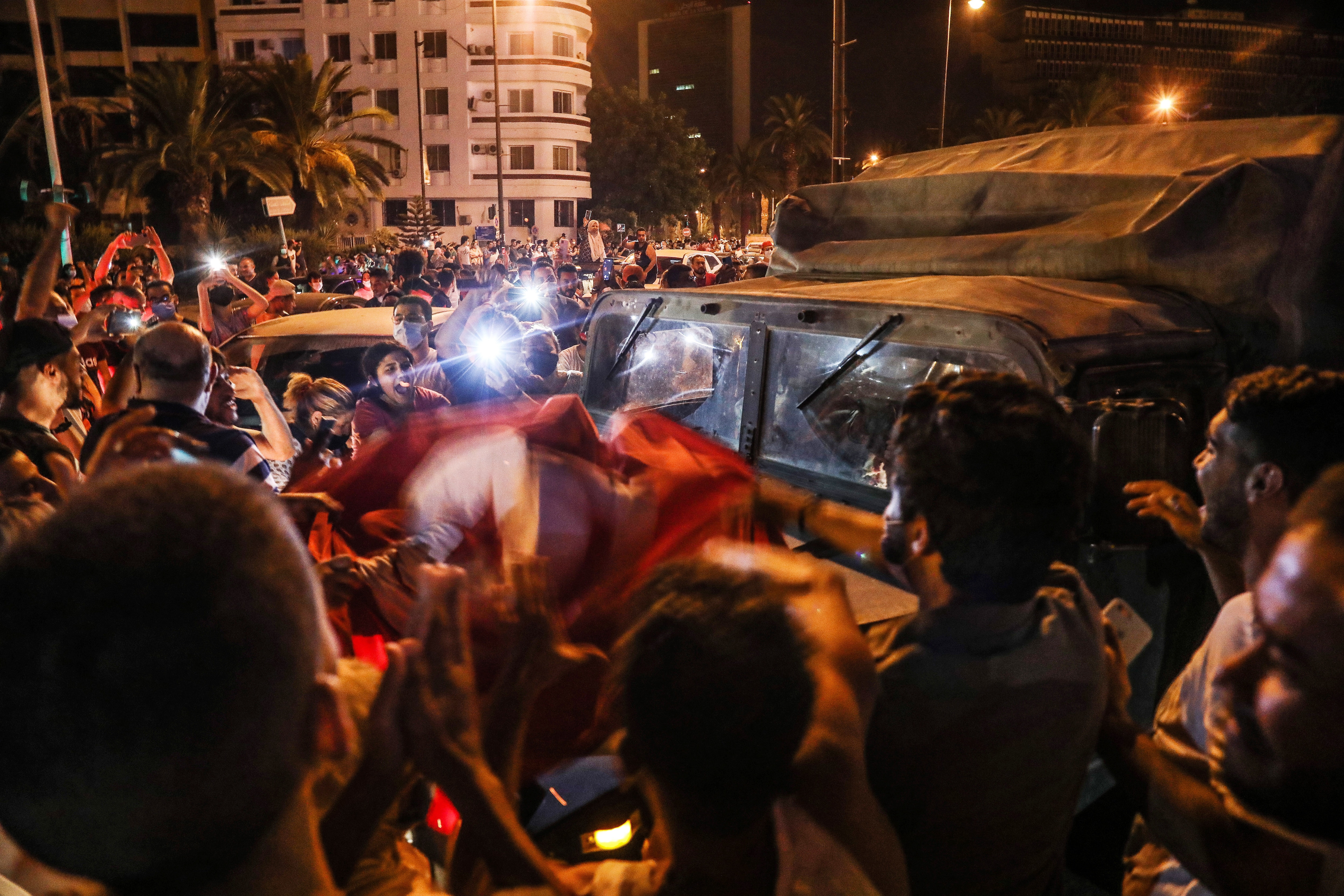 Supporters of Tunisia's President Kais Saied gather on the streets