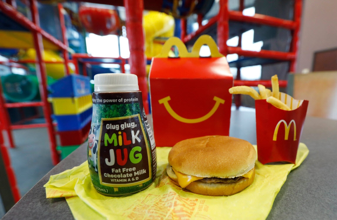A Happy Meal featuring non-fat chocolate milk and a cheeseburger with fries (AAP)