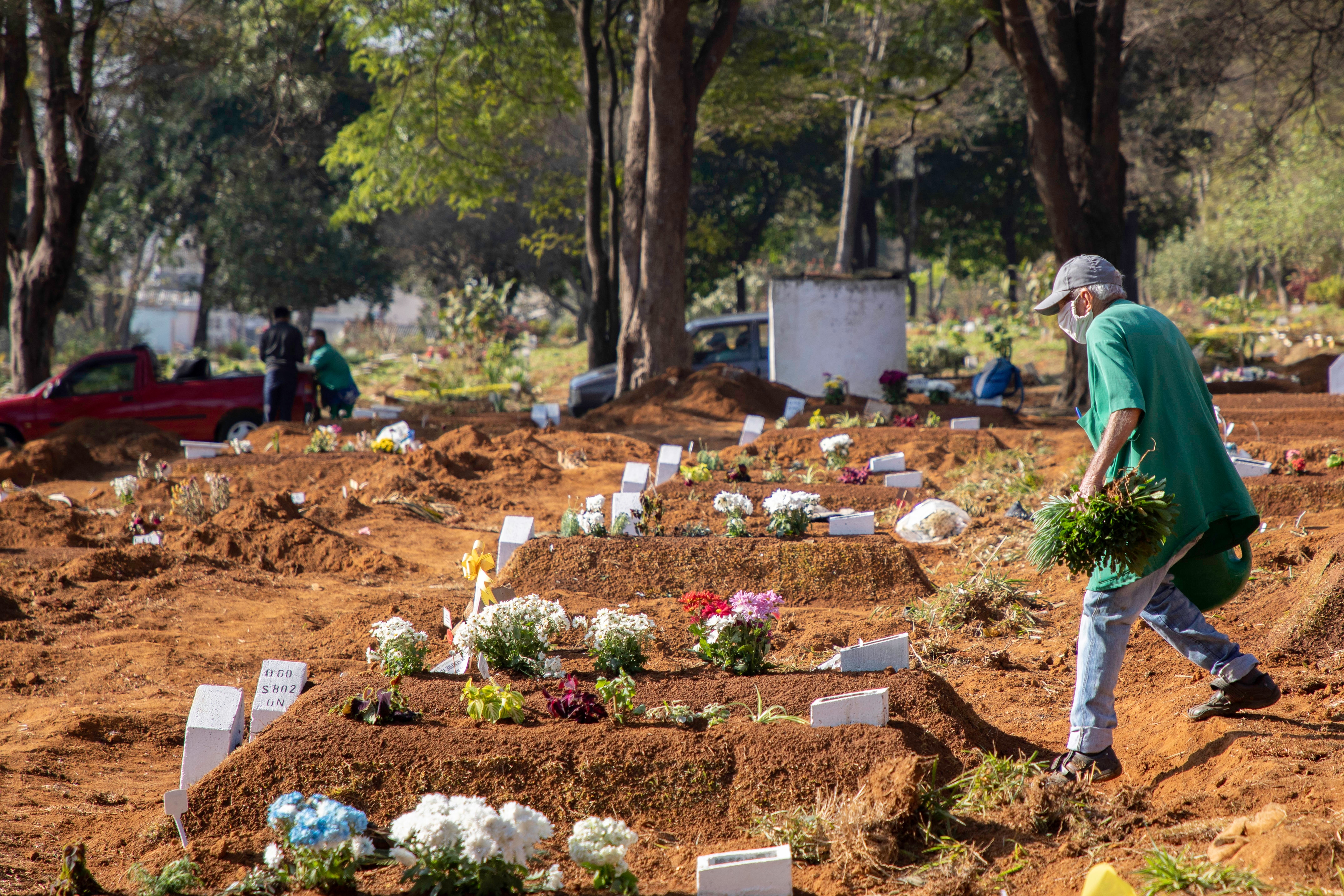 Collective burials at Vila Formosa Cemetery in Sao Paulo, Brazil.