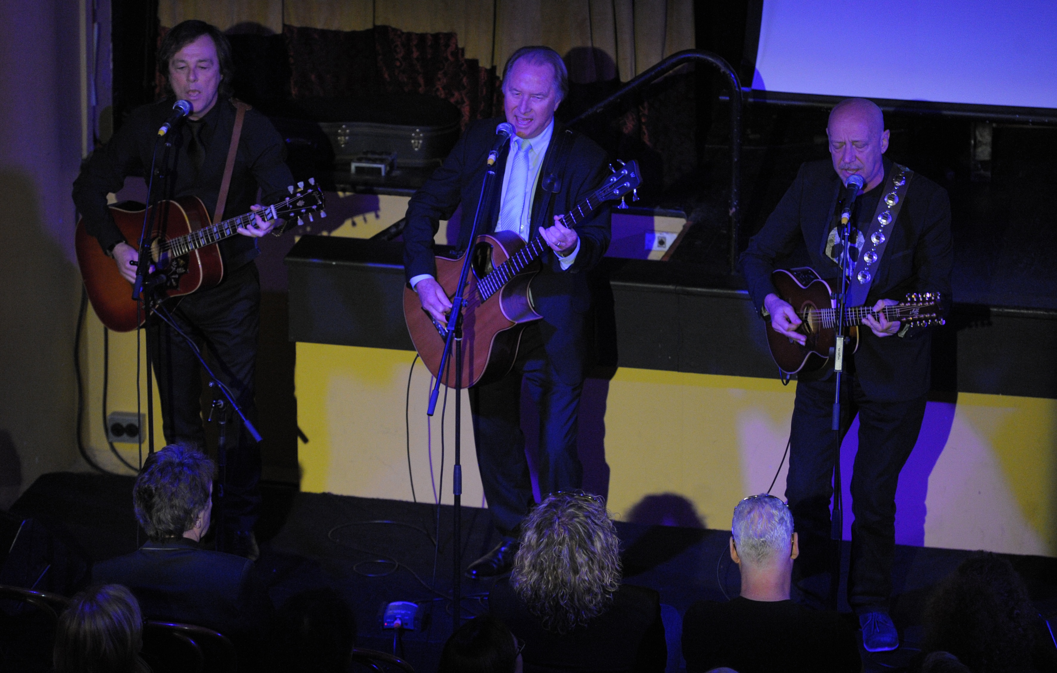 (L-R) Ted Lethborg, Glenn Wheatley and Russell Morris perform Because I Love You at the funeral service of The Masters Apprentices singer Jim Keays in 2014.