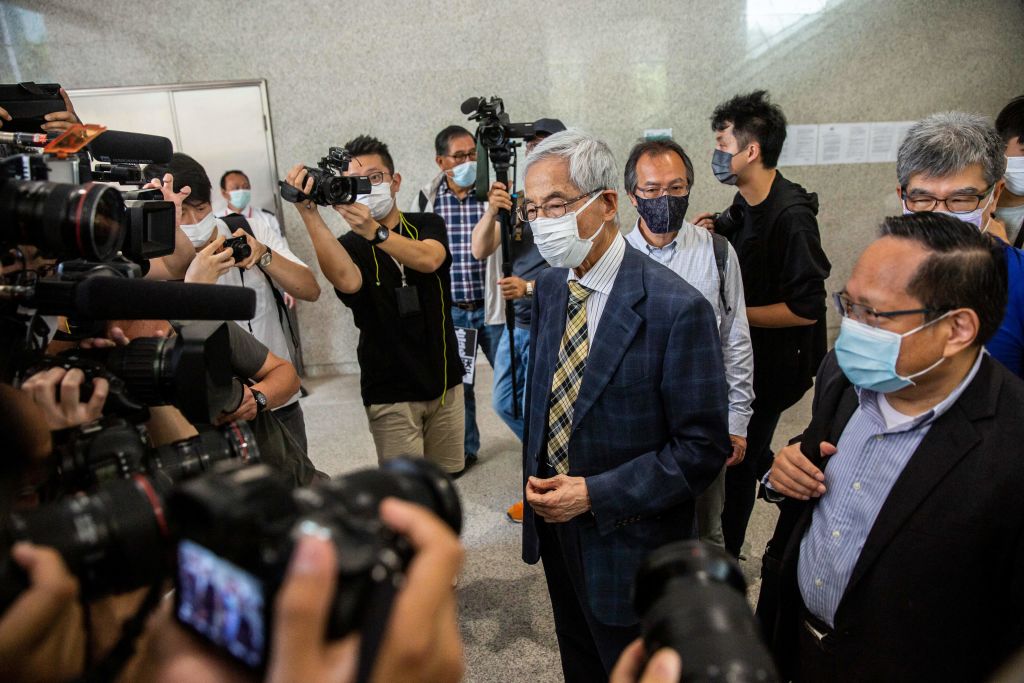 Former lawmaker and barrister Martin Lee (C) arrives at West Kowloon Court in Hong Kong on 1 April 2021 before the verdict is handed down.