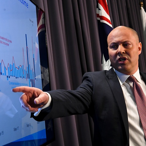 Treasurer Josh Frydenberg speaks to the media during a press conference at Parliament House in Canberra, Wednesday, December 1, 2021. (AAP Image/Lukas Coch) NO ARCHIVING