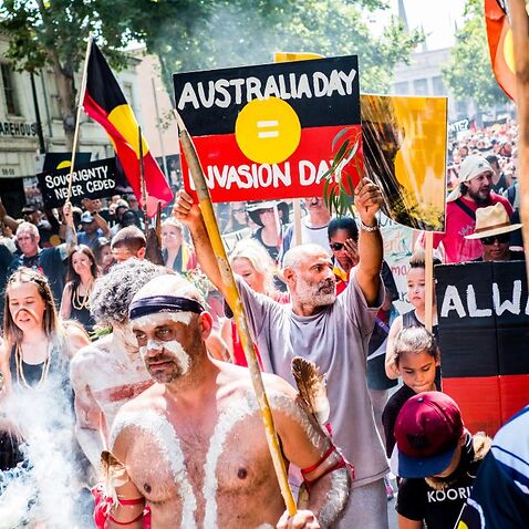 Protesters march during a protest by Aboriginal rights activist on Australia Day in Melbourne this year 2018. 