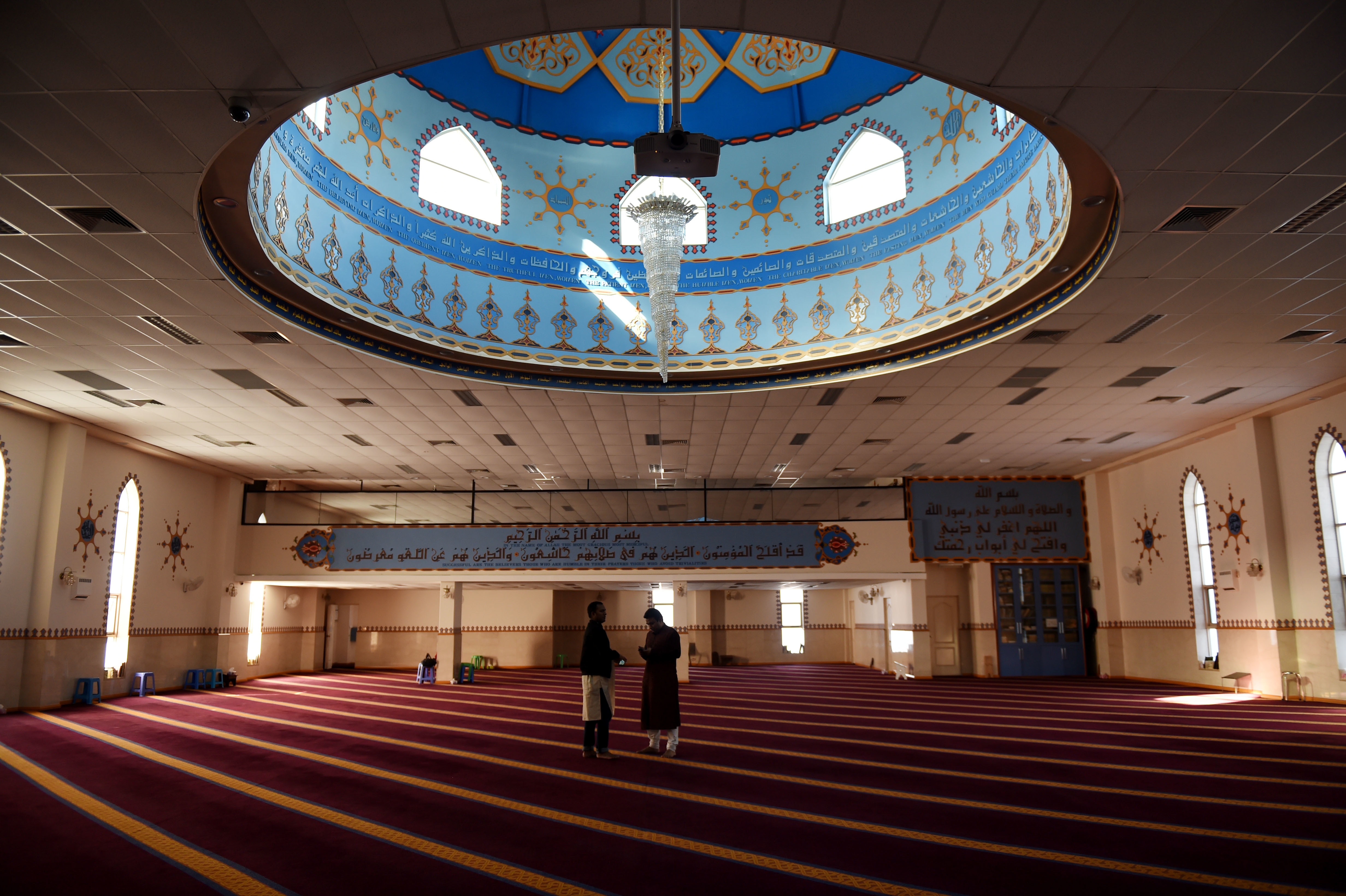 Men gather to pray at Lakemba Mosque in Sydney, Friday, Aug. 22, 2014. (AAP Image/Tracey Nearmy) NO ARCHIVING, EDITORIAL USE ONLY