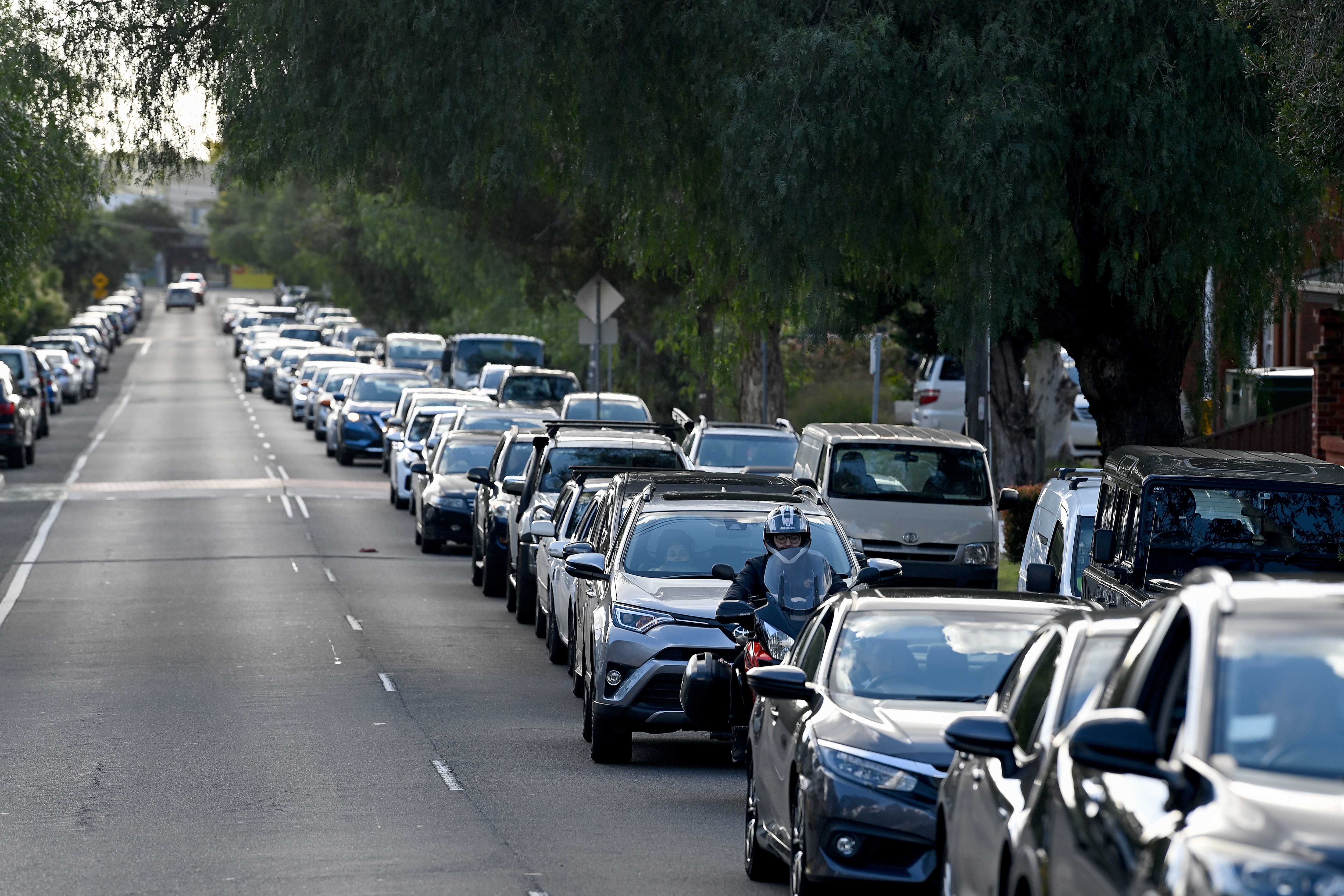 A line of cars queued outside a COVID-19 PCR testing clinic in Sydney on 3 January.