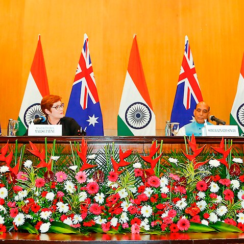 Top ministers from India and Australia on Saturday called for international anti-terror efforts in Afghanistan, bolstering mutual security ties and blunting China's growing regional assertiveness.