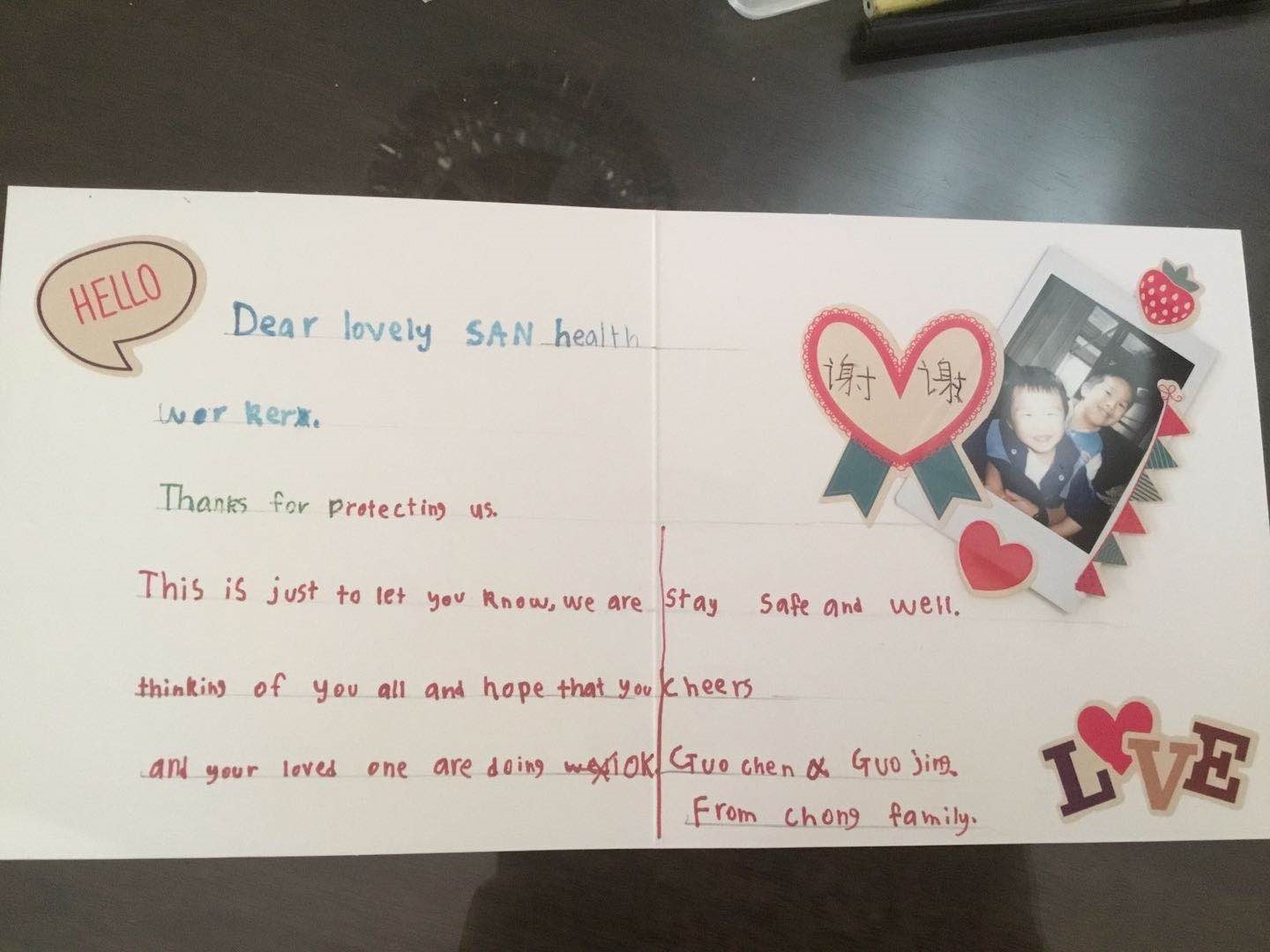 The card sent with masks by a Chinese Australian family