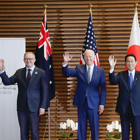 PM Anthony Albanese, U.S. President Joe Biden, Japanese PM Fumio Kishida and Indian PM Narendra Modi wave ahead of the summit of the 