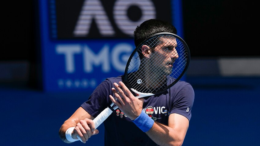 Novak Djokovic practices on Rod Laver Arena, Melbourne, Wednesday, January 12, 2022.