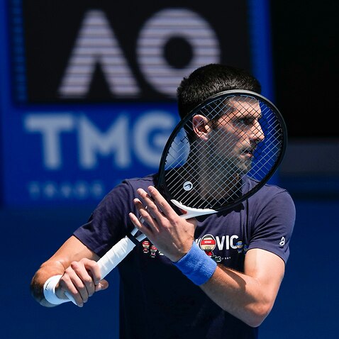 Novak Djokovic practices on Rod Laver Arena, Melbourne, Wednesday, January 12, 2022. 