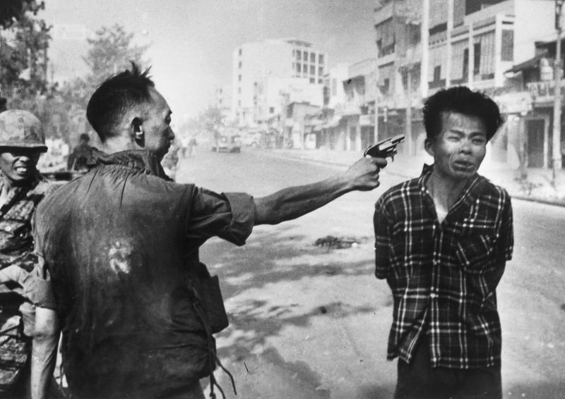 South Vietnamese National Police Chief General Nguyễn Ngọc Loan executing Viet Cong officer Nguyễn Văn Lém in Saigon.