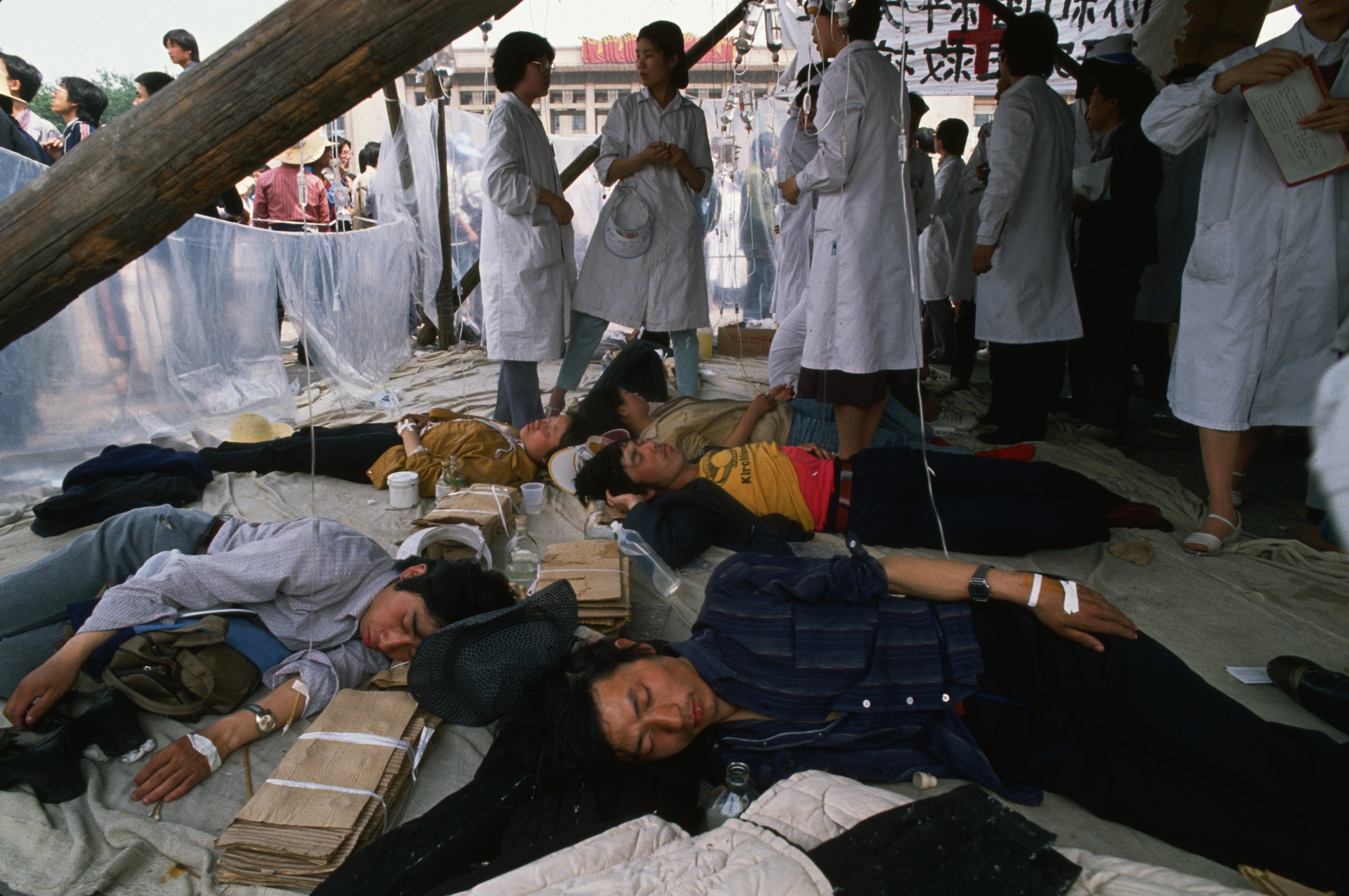 Students from a Beijing nursing school look after hunger strikers during protests in Tiananmen Square. 