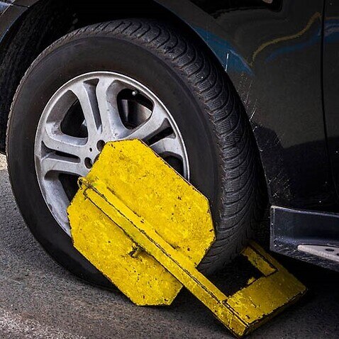 Wheel clamping to be banned across WA under new laws to stop 'predatory' practice