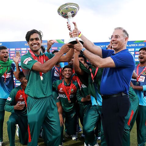 Bangladesh is presented with the trophy 