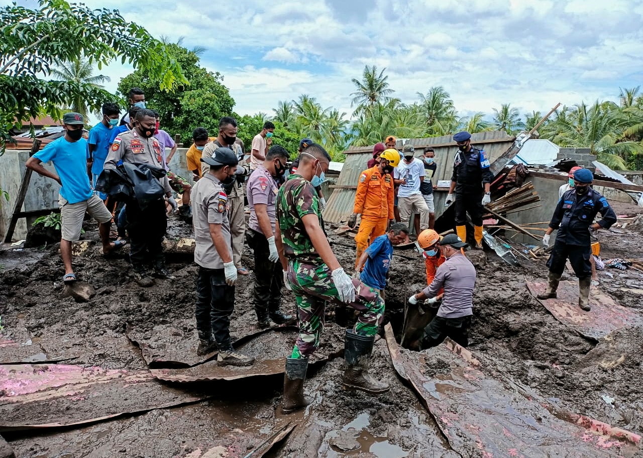 Rescuers race to find dozens missing after deadly floods kill at 