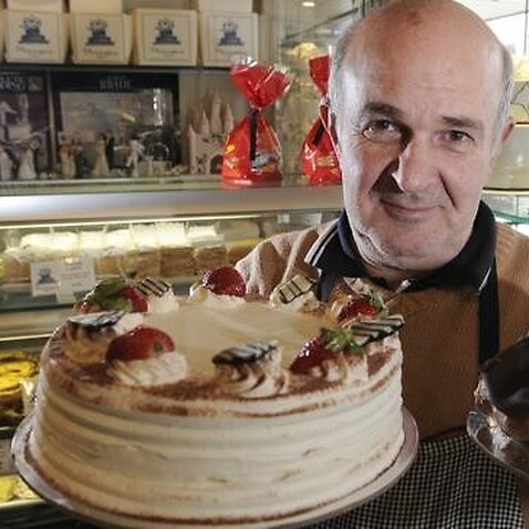Frank Portelli with some of his cakes