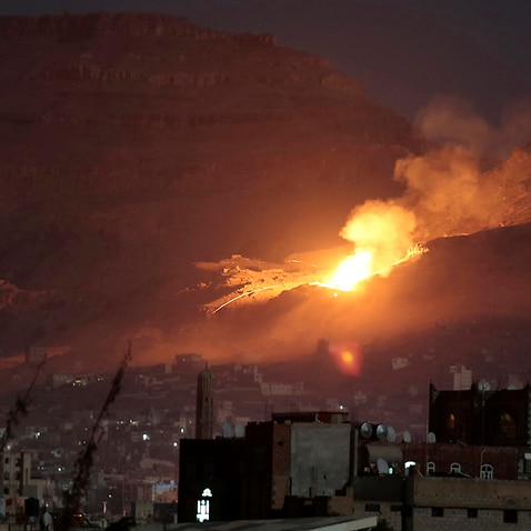 Fire and smoke rise after a Saudi-led airstrike
