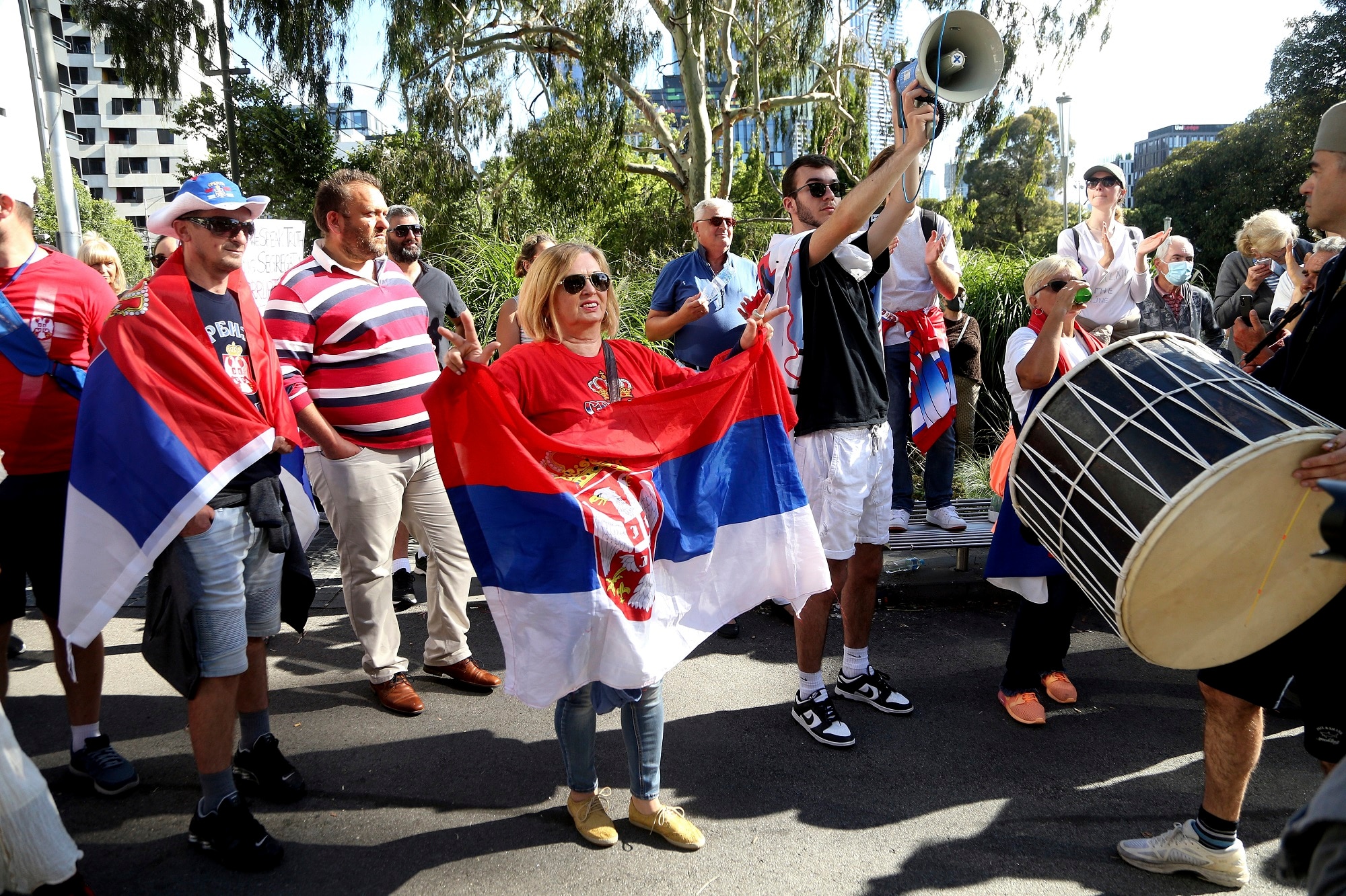 Protestors and fans of Serbia's Novak Djokovic outside the Park Hotel. 