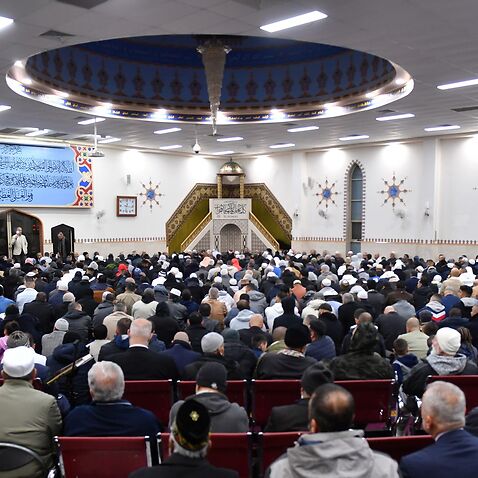 Members of the muslim community celebrate Eid al-Fitr, marking the end of the month-long fast of Ramadan with prayer at Lakemba Mosque in Sydney.