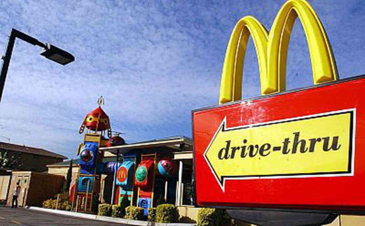 “If you intend to use your mobile phone to pay at the drive-through window, apply the hand brake, switch the engine off and then access your mobile phone,” advises Victoria Police. Drive-thru at Maccas