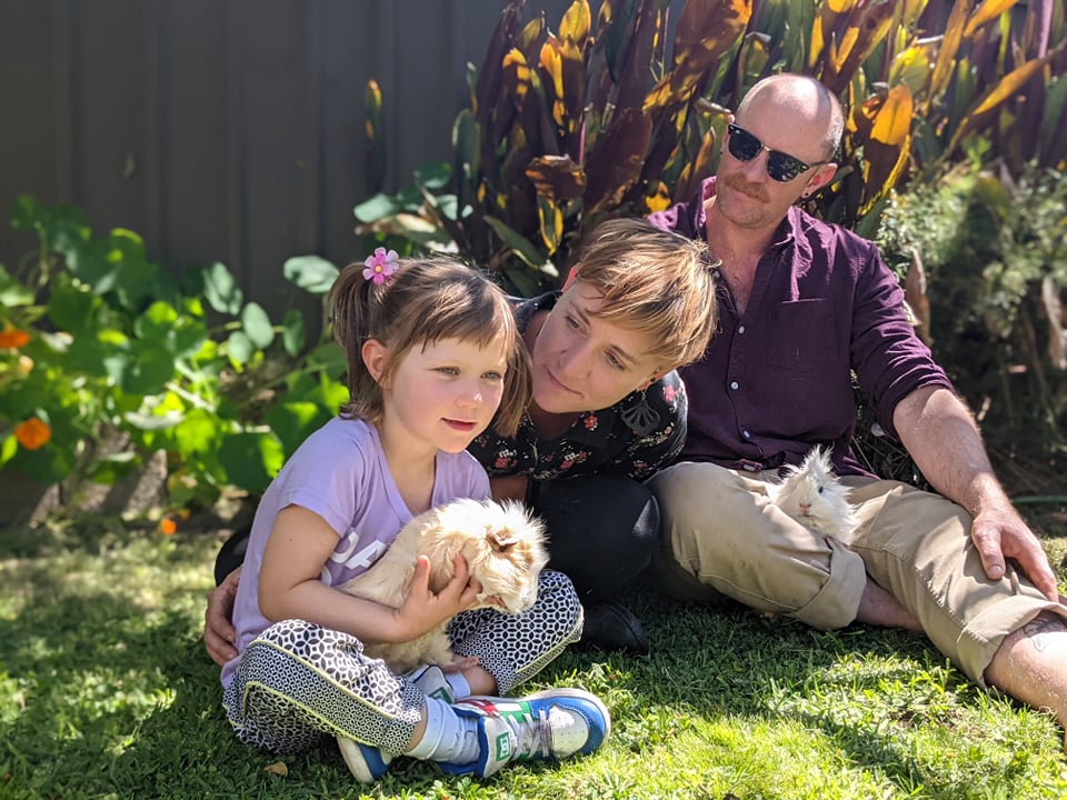 Fiona Lee (centre), with her partner and their daughter.