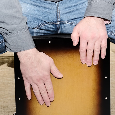 drummer's hands while practicing percussion instrument