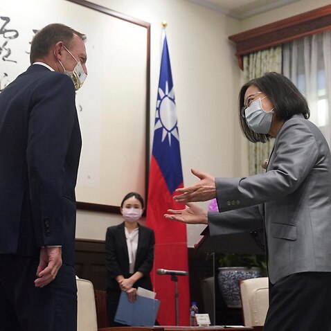 Taiwanese President Tsai Ing-wen, right meets with former Prime Minister Tony Abbott in Taipei.