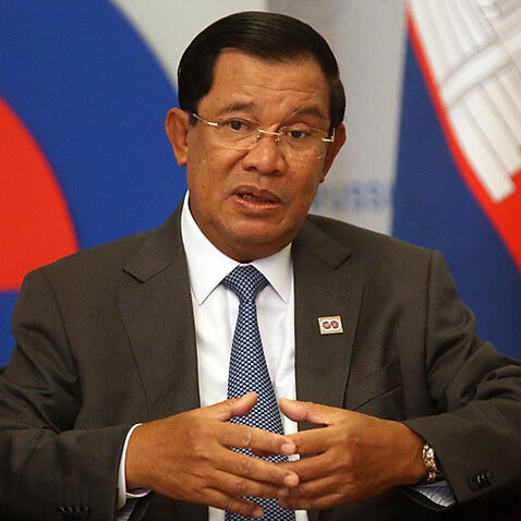 Cambodia's Prime Minister Hun Sen attends a meeting with Russian President Vladimir Putin.
