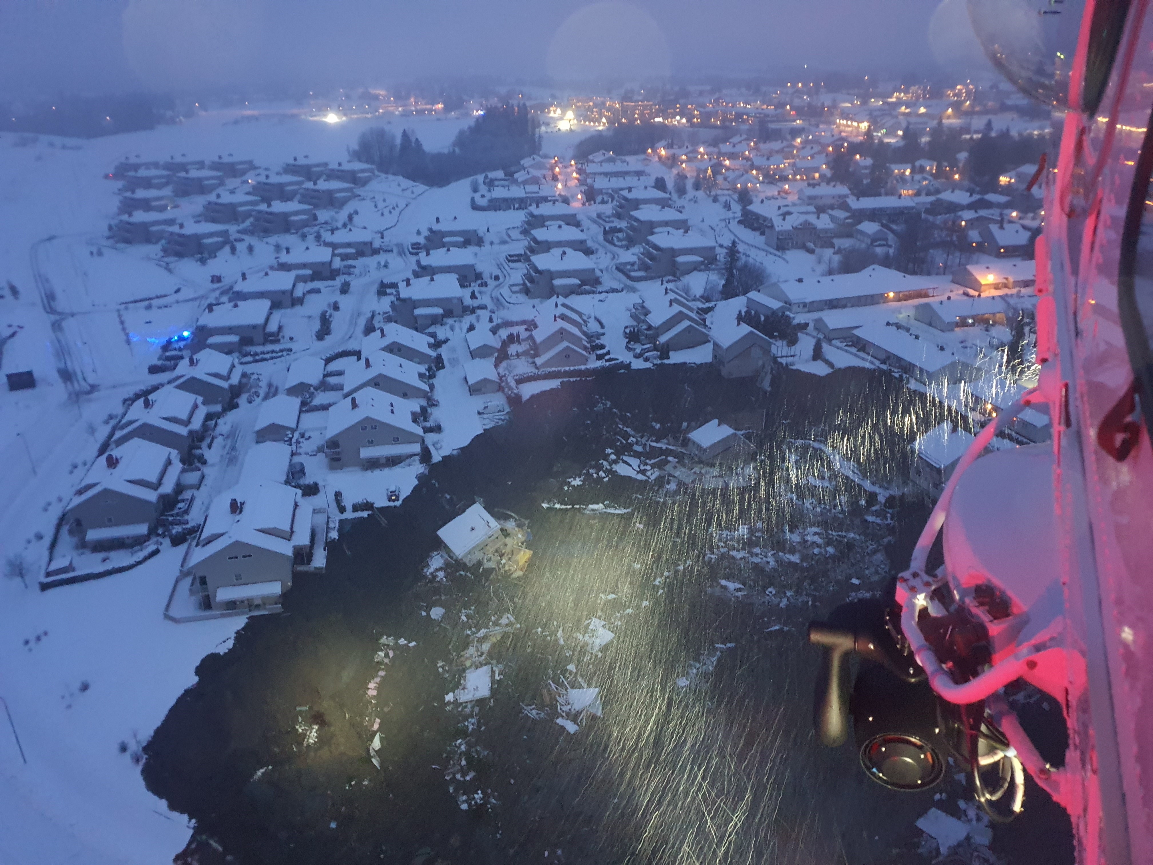 View from a rescue helicopter over the area of landslide in the village Ask.