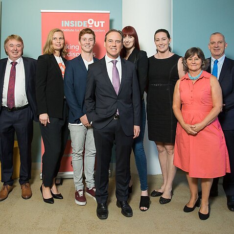 Minister for Health Greg Hunt (centre) with parents and former sufferers of eating disorders during the launch of The InsideOut Institute at Sydney University in Sydney