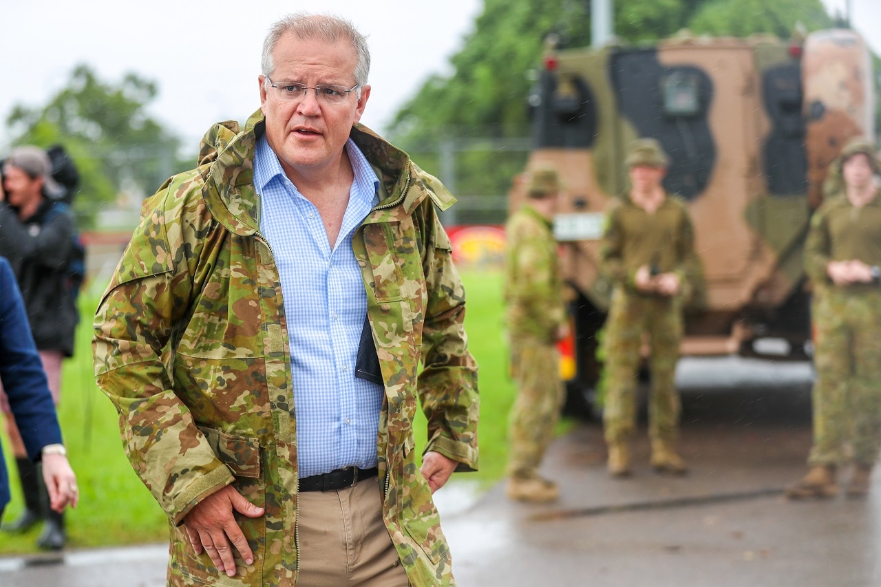 Prime Minister Scott Morrison is seen visiting flood affected areas in Townsville, Tuesday, February 5, 2019. Hundreds of people are still waiting for help.