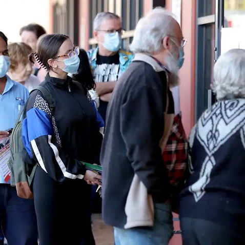 Voters queue outside an Australian Electoral Commission early voting centre in Willetton in the Federal electorate of Tangney in Perth, Tuesday, 17 May, 2022