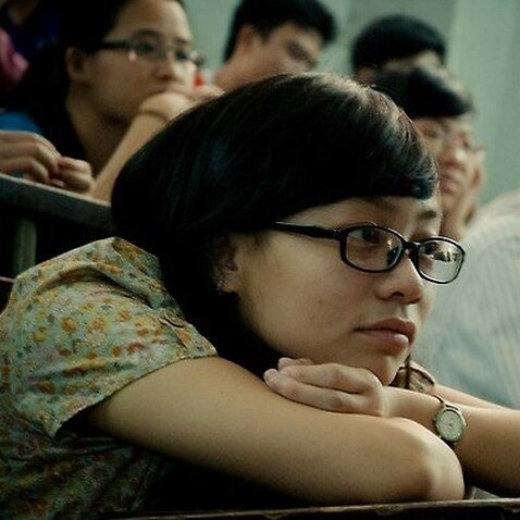 Asian Student sitting in a lecture class
