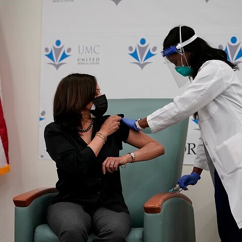 US Vice President-elect Kamala Harris receives the Moderna COVID-19 vaccine 