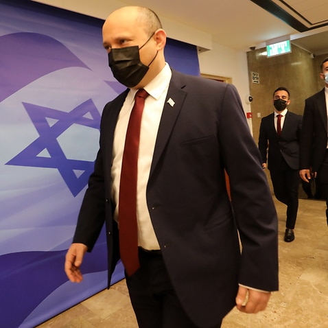 Israeli Prime Minister Naftali Bennet arrives at his office.