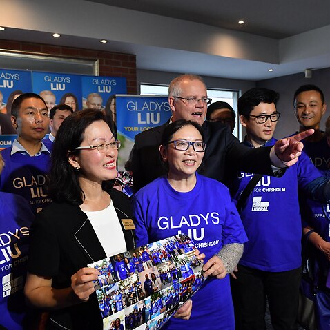 Prime Minister Scott Morrison and Liberal candidate for Chisholm Gladys Liu (L) at her campaign launch at the Box Hill Golf Club in Melbourne, Monday, April 15, 2019. (AAP Image/Mick Tsikas) NO ARCHIVING
