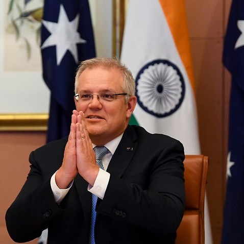 Australian Prime Minister Scott Morrison speaks to Indian Prime Minister Narendra Modi during the 2020 Virtual Leaders Summit between Australia and India at Parliament House in Canberra, Thursday, June 4, 2020. (AAP Image/Lukas Coch) NO ARCHIVING