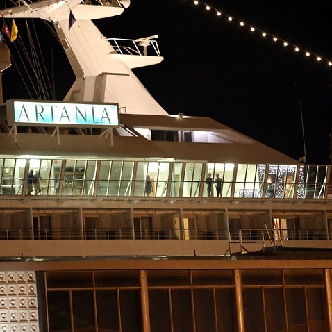 Passengers on board the MS Artania have voiced frustration with the lack of social distancing 