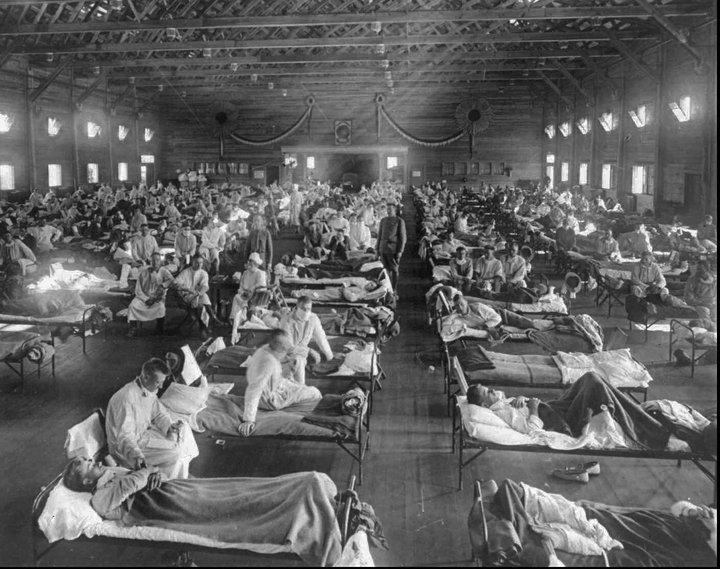 Spanish flu victims crowd into an emergency hospital in Kansas, USA in 1918 