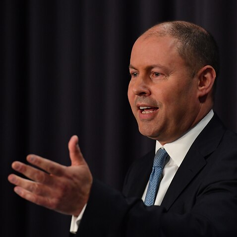 Treasurer Josh Frydenberg addresses the media during a press conference as he hands down the Mid-Year Economic and Fiscal Outlook.