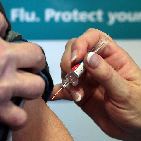 A person getting a flu jab 