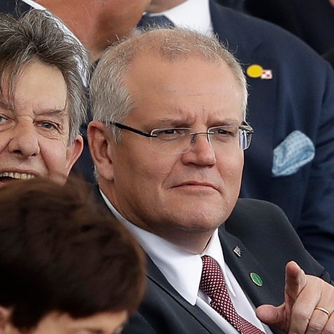Australian Prime Minister Scott Morrison gestures, as he attends an event to mark the 75th anniversary of D-Day in Portsmouth, England 