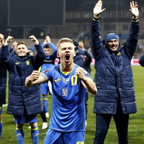 Ukrainian soccer players celebrate their victory FIFA World Cup 2022