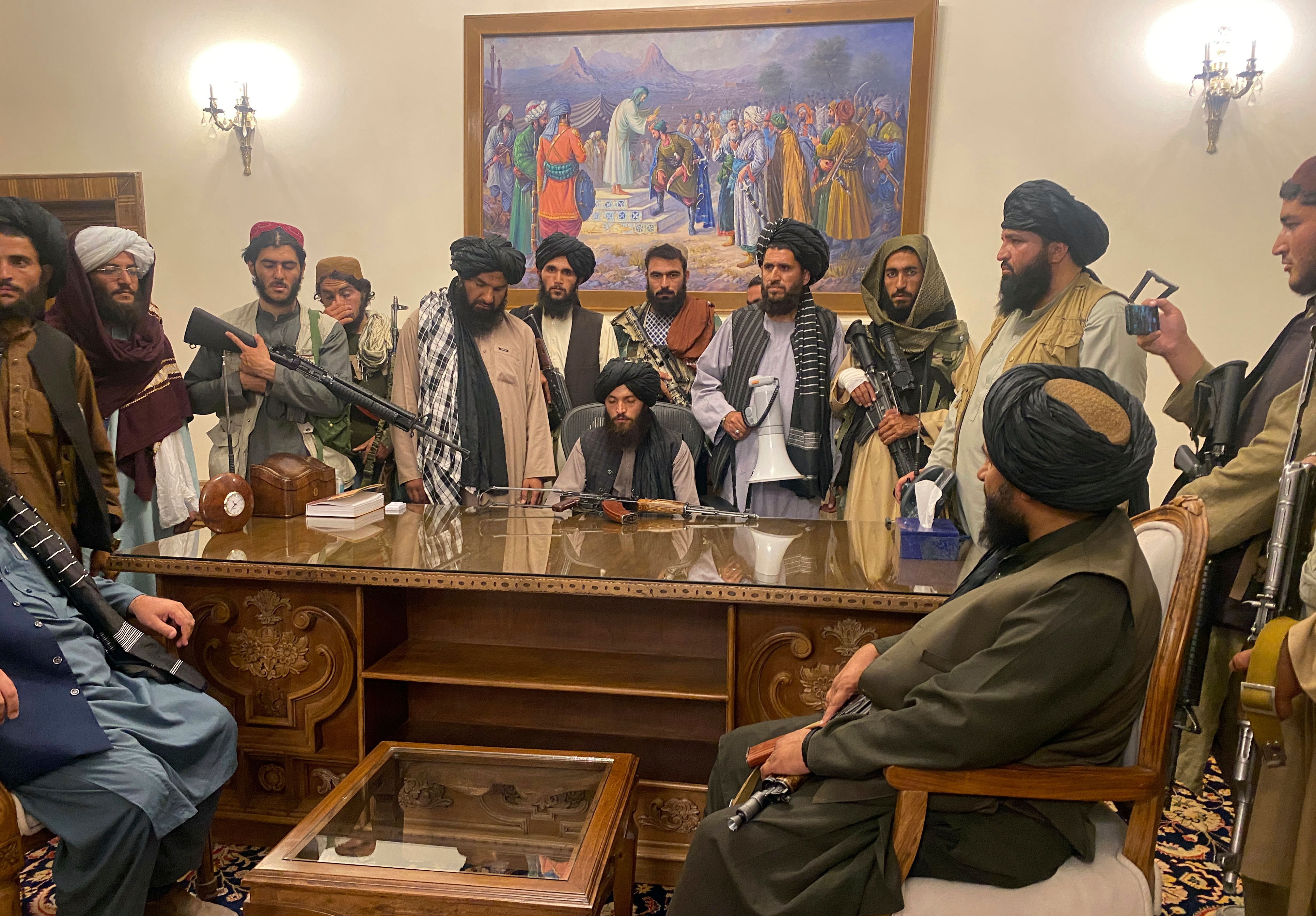 Taliban fighters take control of Afghan presidential palace after the Afghan President Ashraf Ghani fled the country.