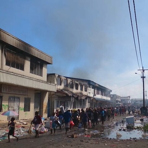 Petrol stations, shops and other businesses in Solomon Islands' capital of Honiara after days of rioting left at least three people dead. 