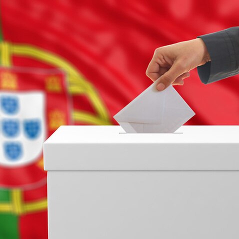 Voter on a Portugal flag background. 3d illustration